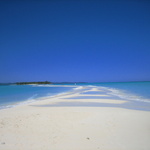 Sable et ciel bleu